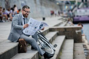 man reading newspaper